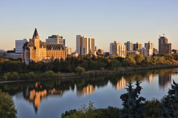 City skyline at sunset over the river