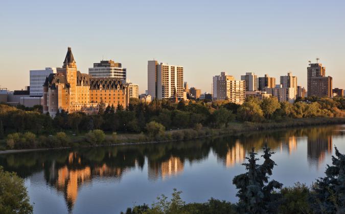 City skyline at sunset over the river